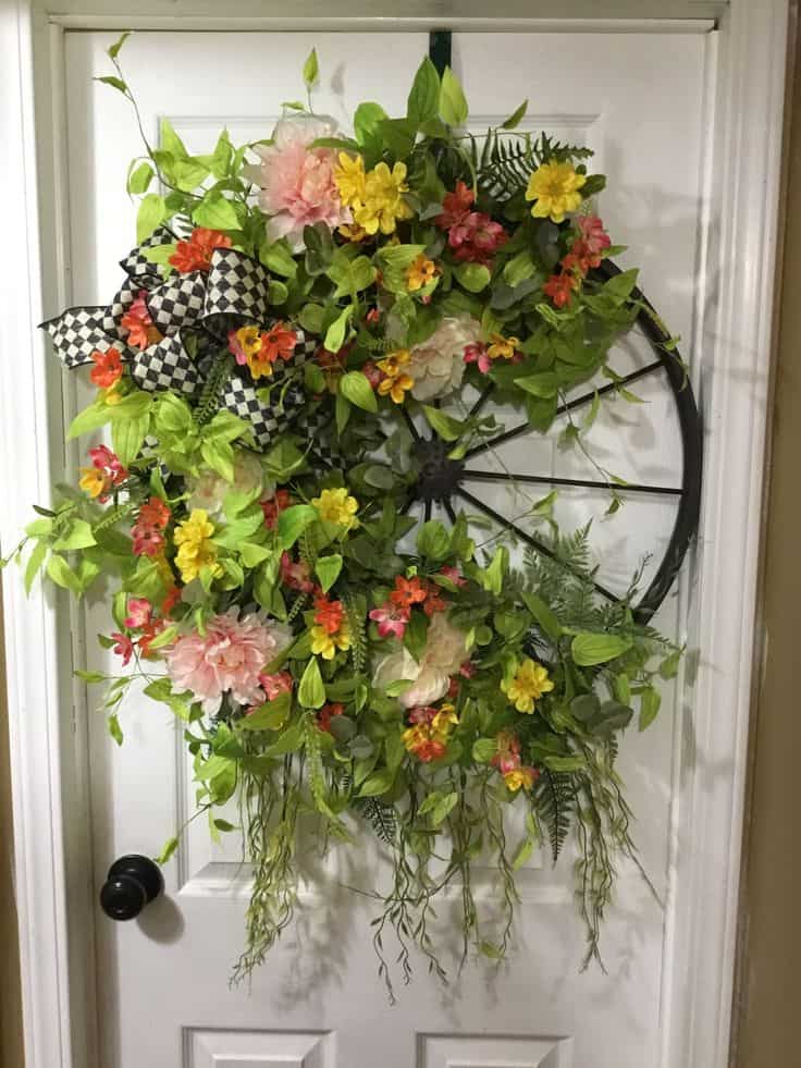 A wheel is a beautiful base for a spring wreath | WildflowersAndWanderlust.com