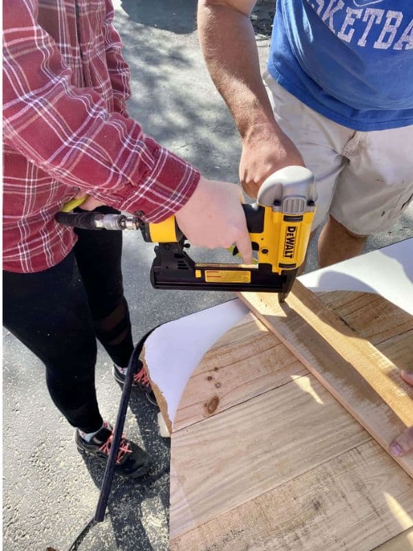Cutting a pallet to create a giant wooden heart for Valentine's Day
